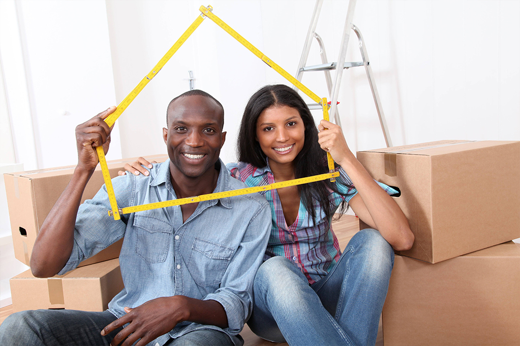 Happy couple sitting on the couch